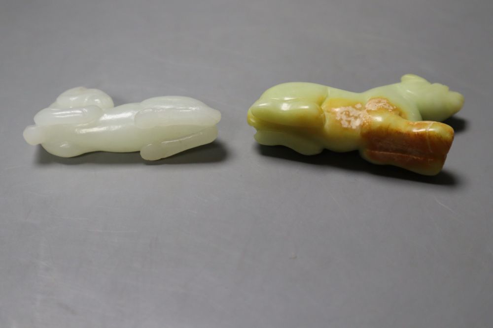 A Chinese pale celadon jade figure of a recumbent horse, 6.4cm and a hardstone figure of a beast,, 7cm